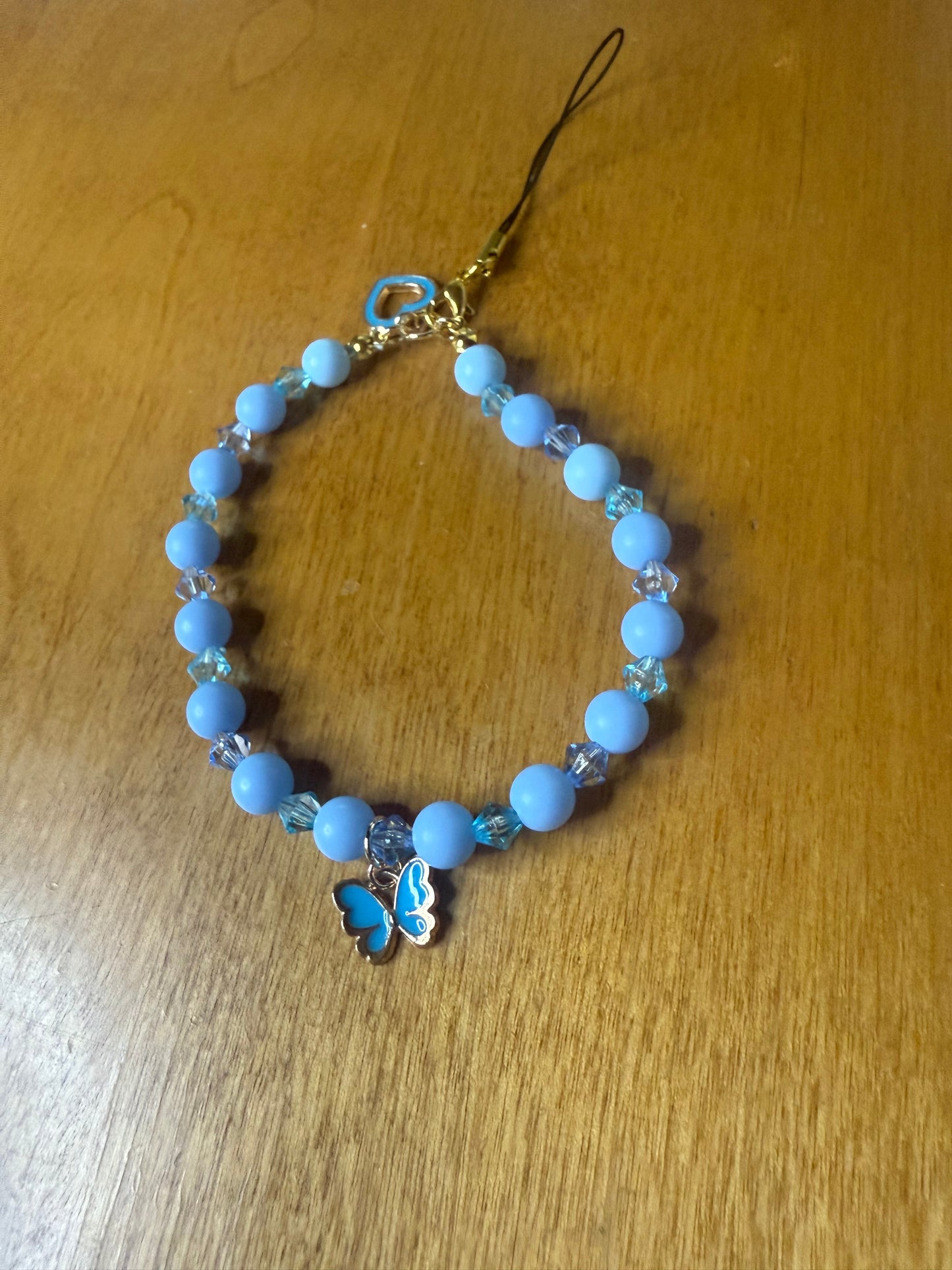 Blue butterfly bracelet/phone charm