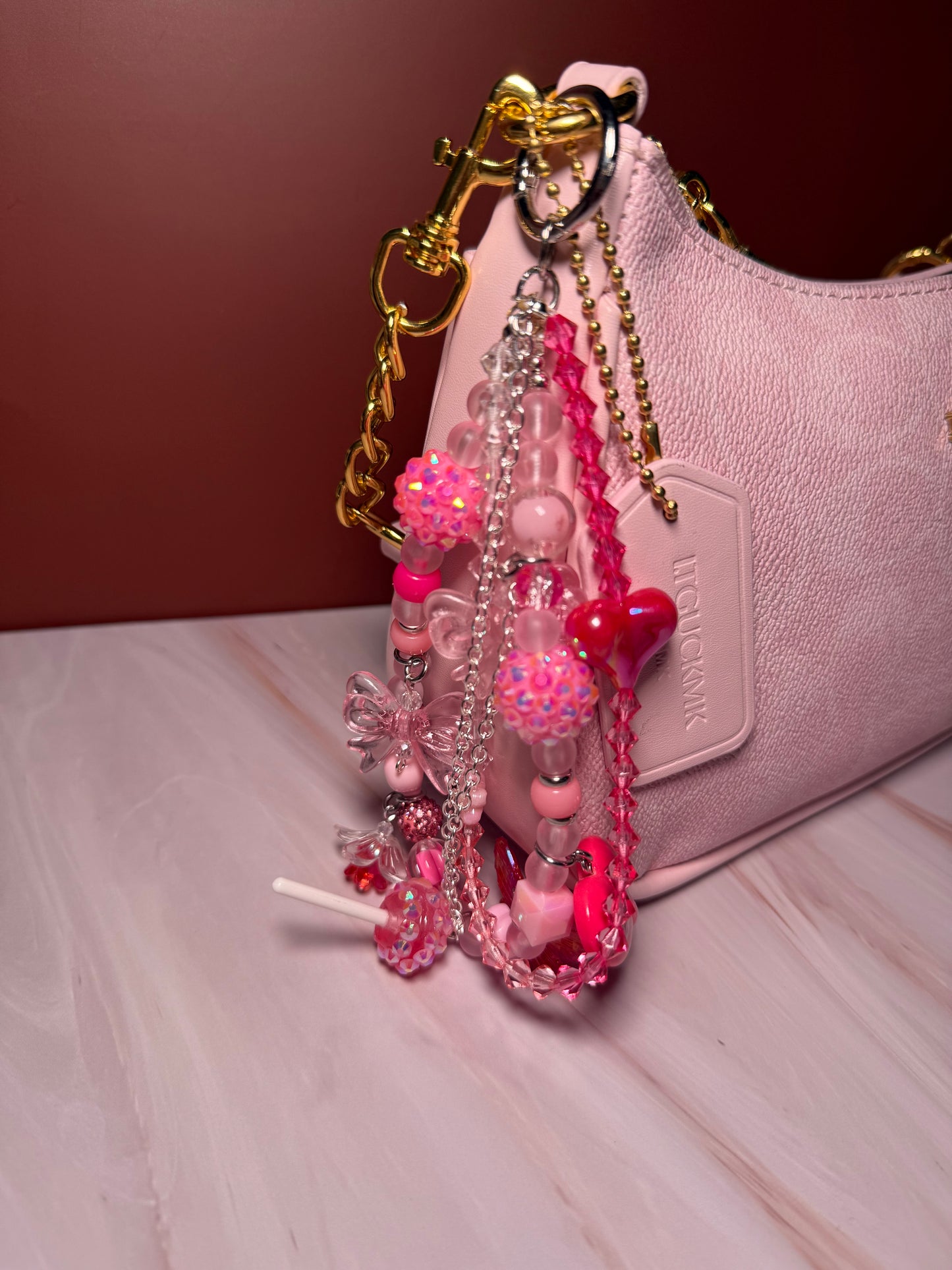 Pink glamsucker purse charm