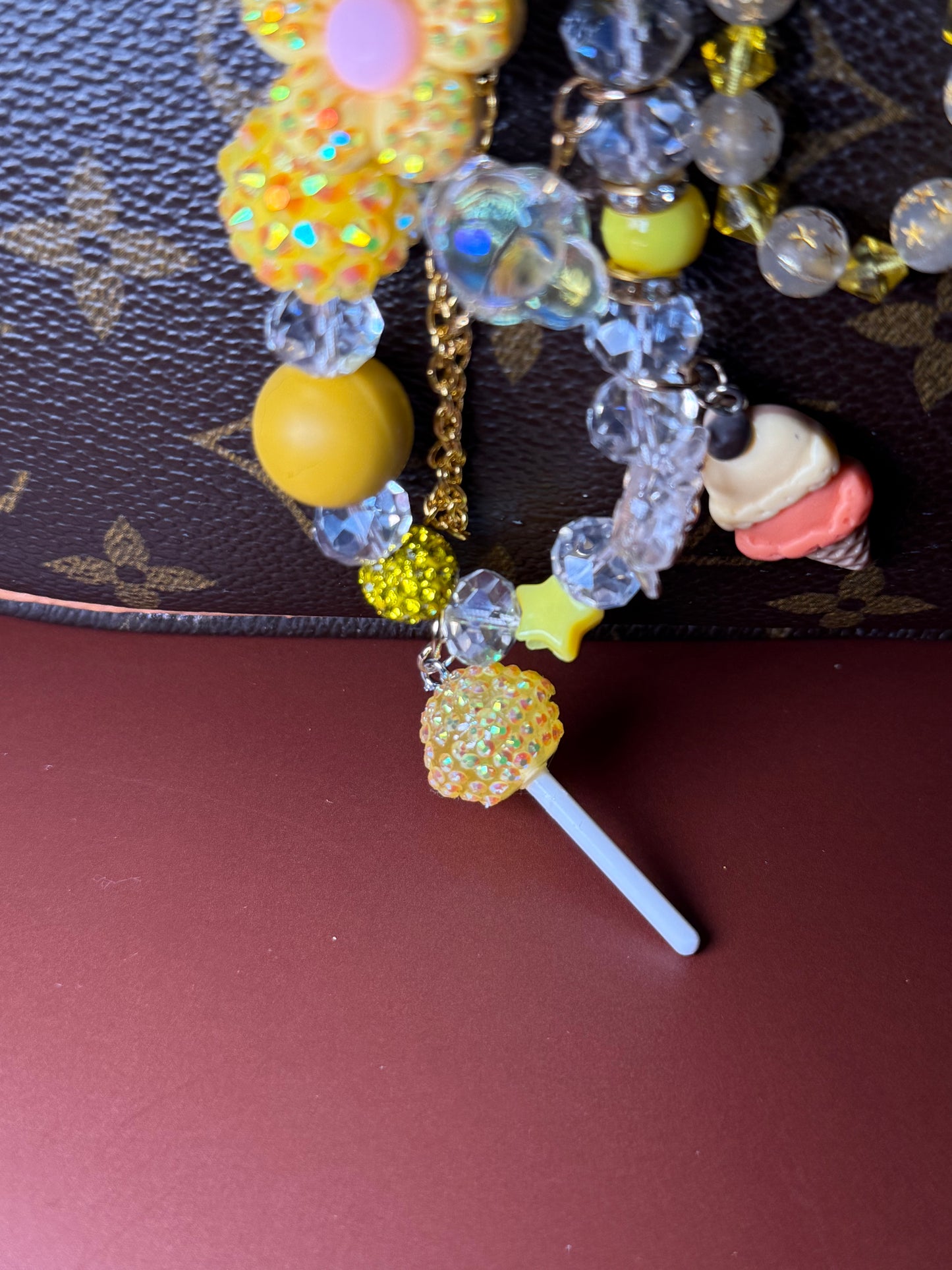 Yellow glamsucker purse charm