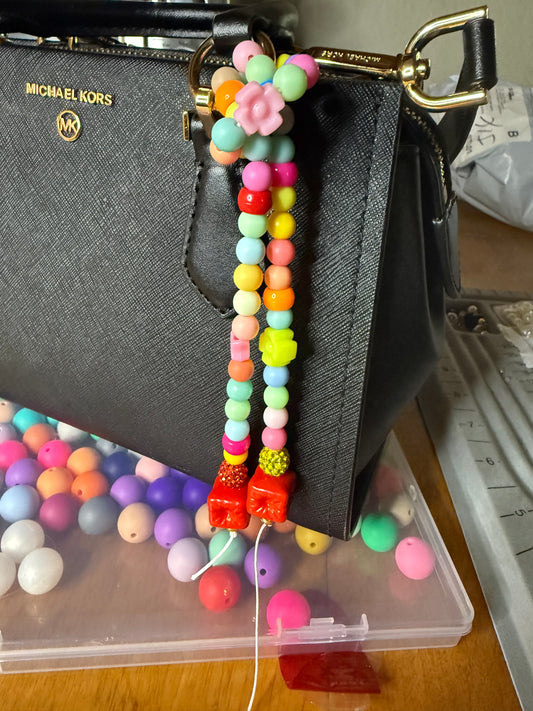 Colorful purse charm tie knot