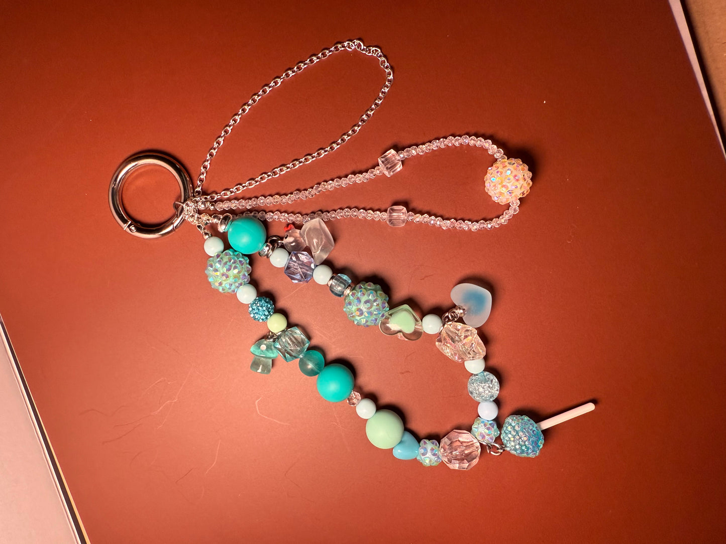 Light blue glamsucker charm