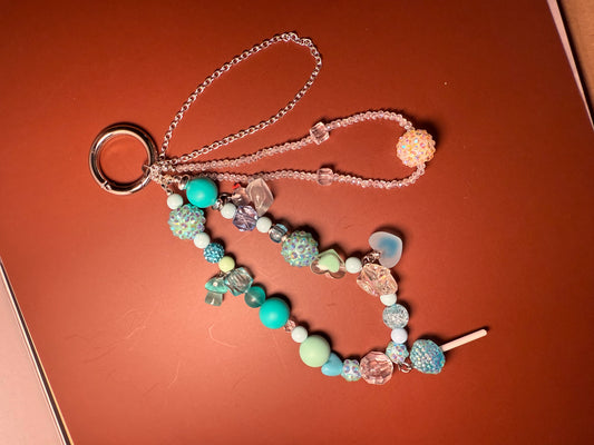 Light blue glamsucker charm
