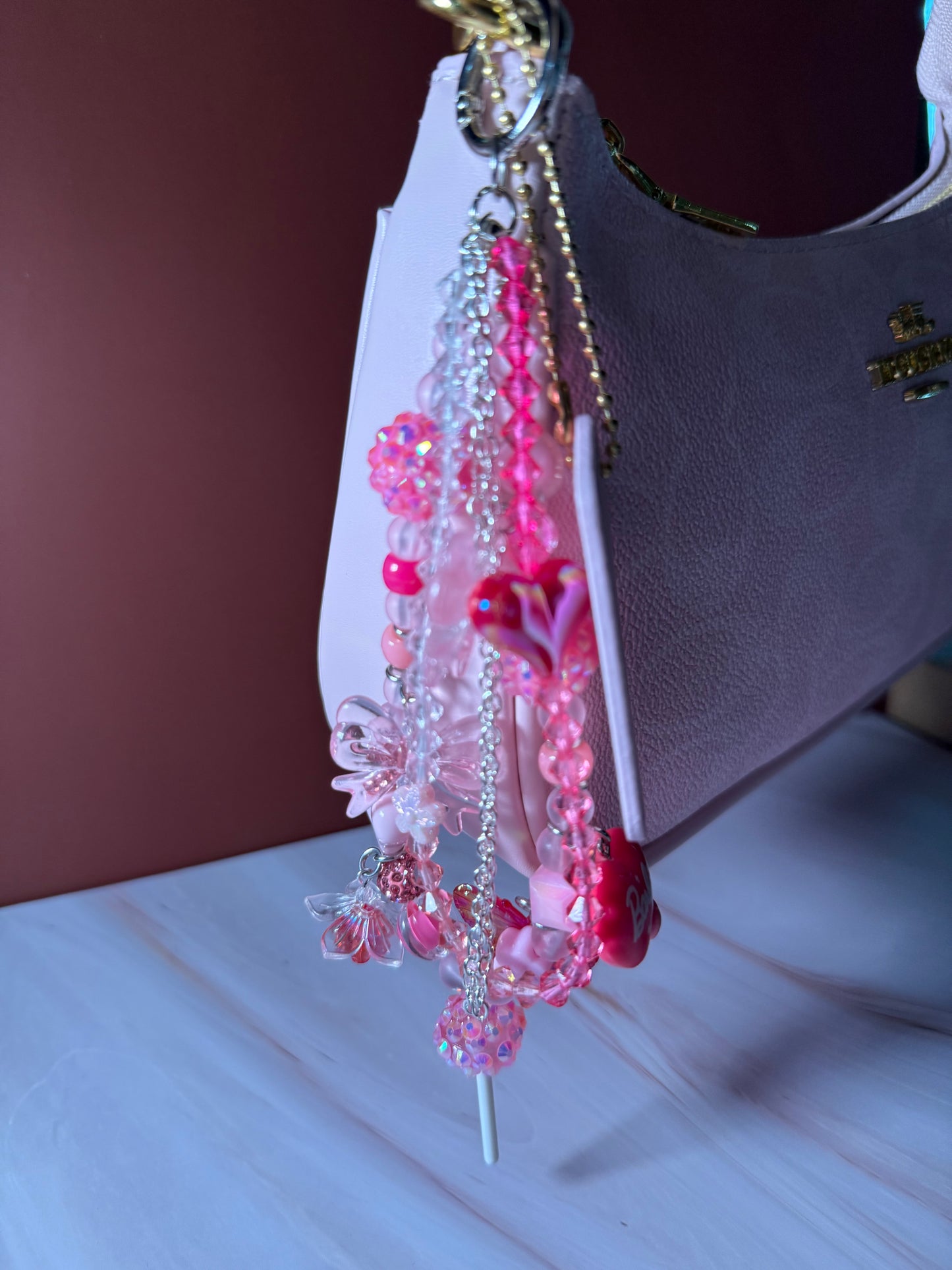Pink glamsucker purse charm