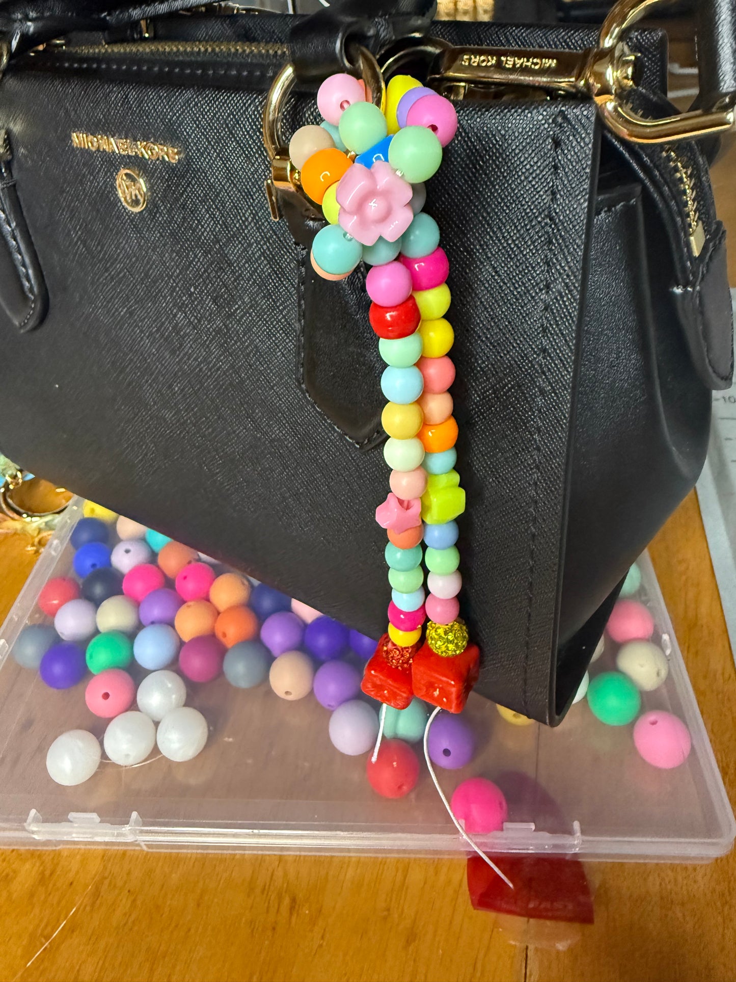 Colorful purse charm tie knot