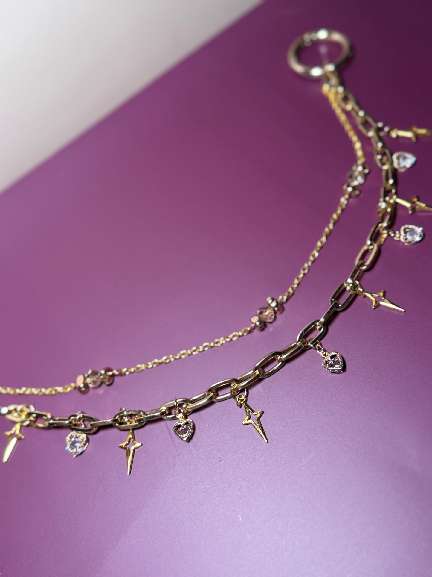 Gold star charm