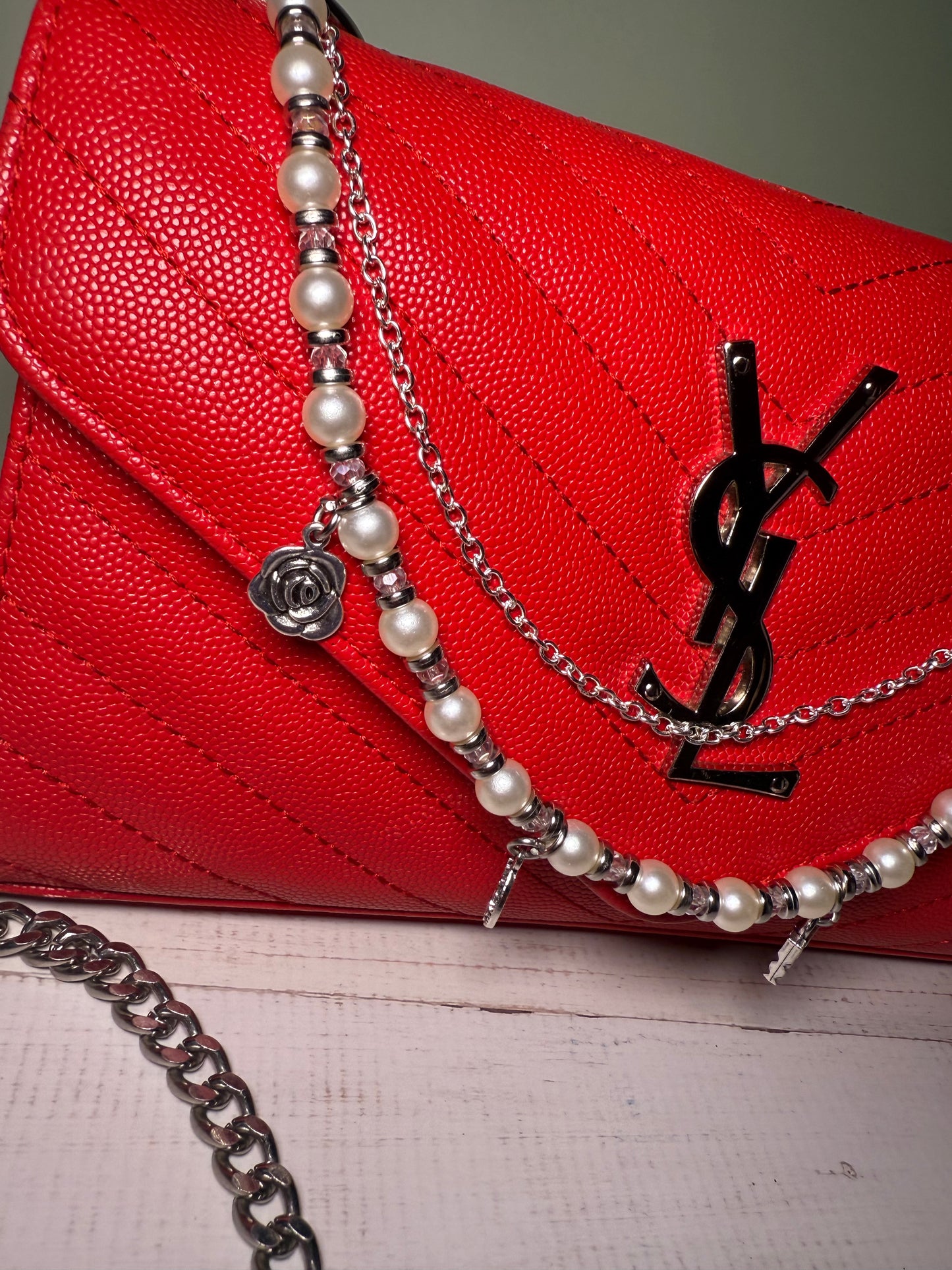 Silver and pearls charm